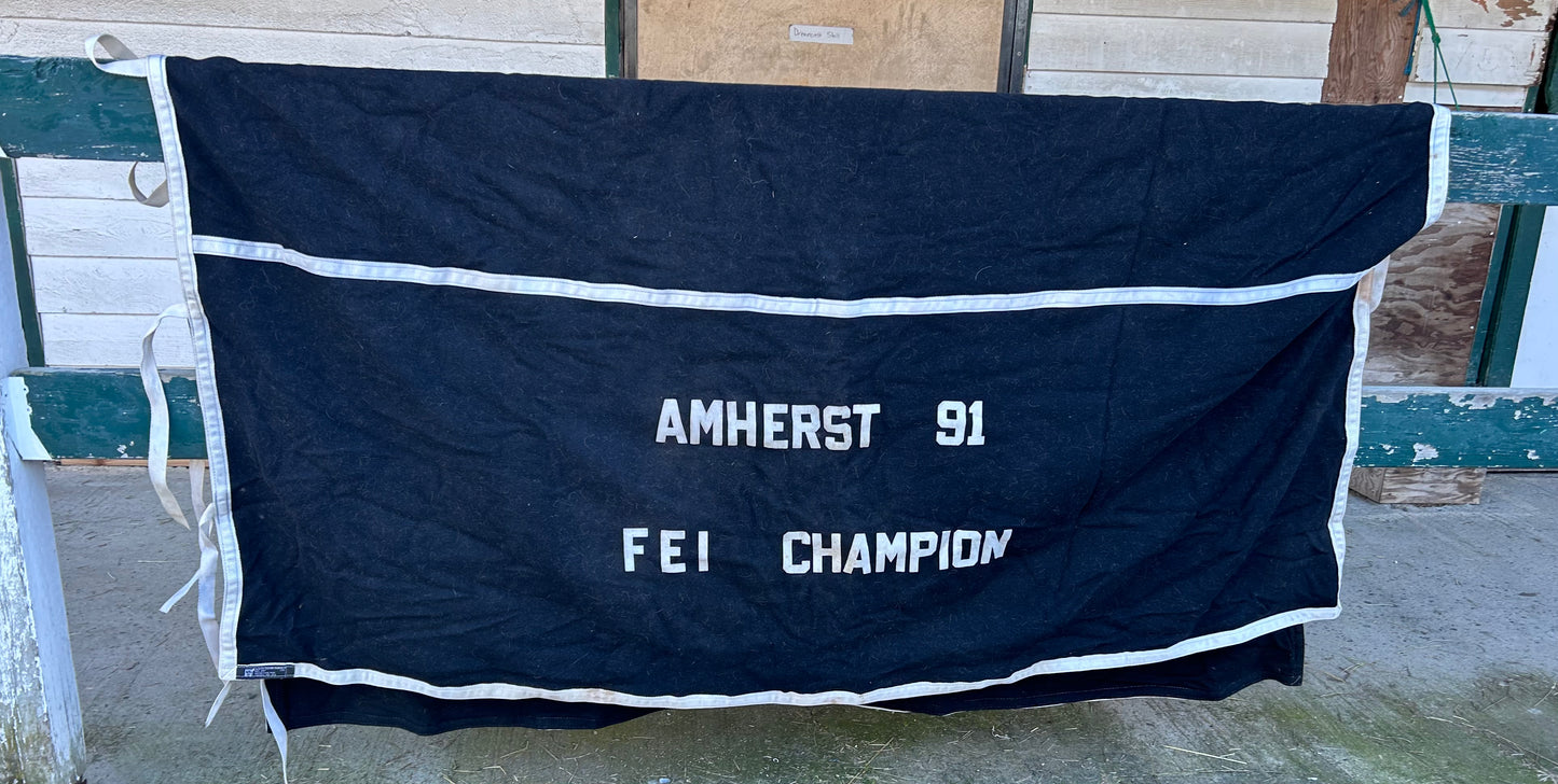 Head to tail wool cooler. Measures 78”. Would fit a 74” or smaller head to tail.