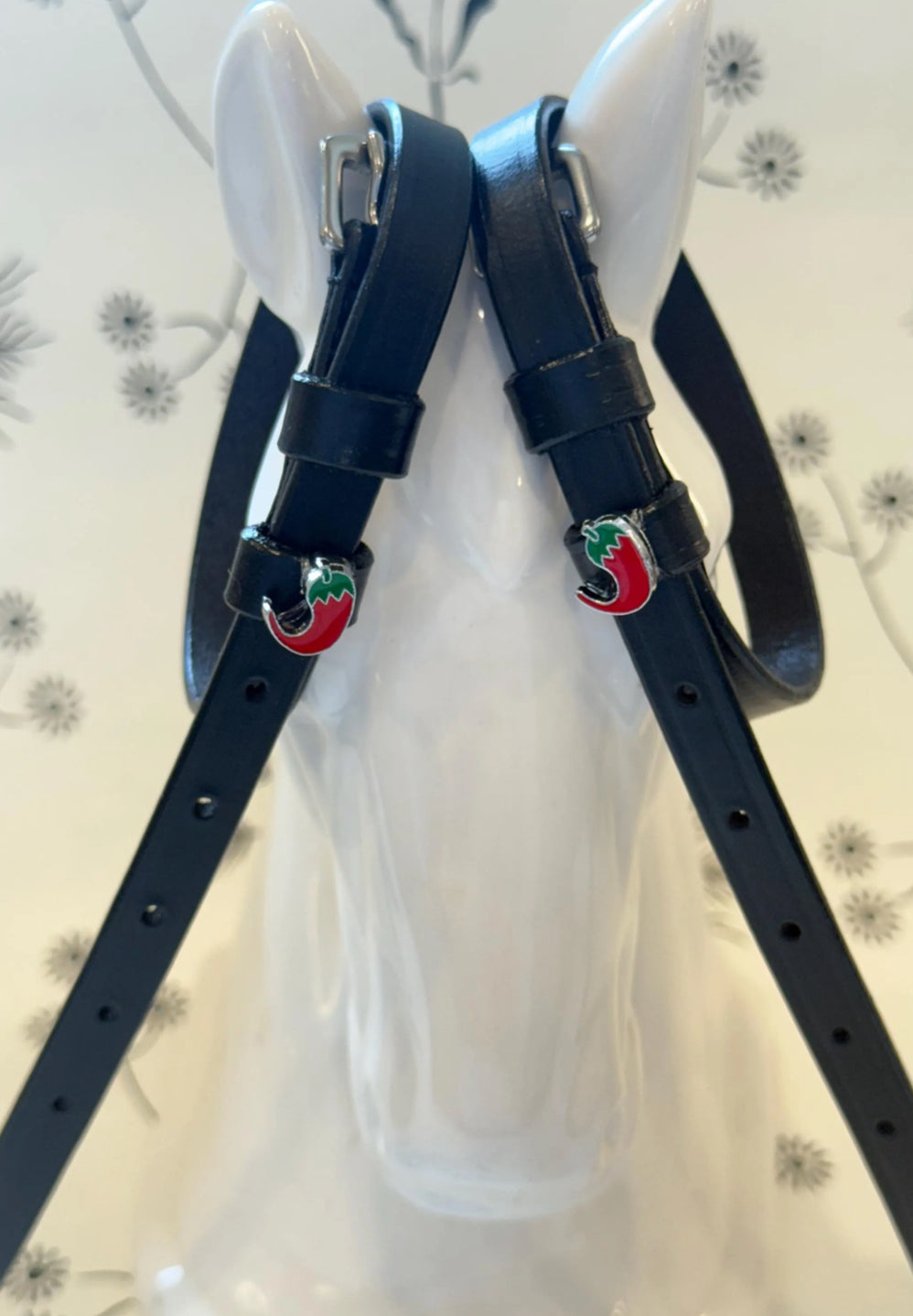 Black leather spur straps chili pepper charm