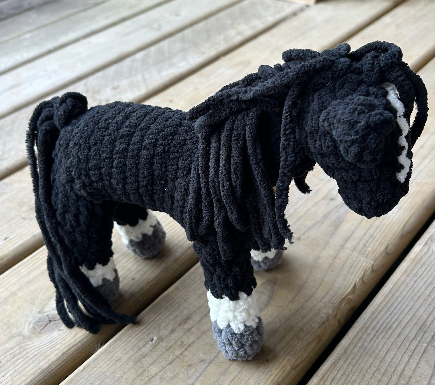 Black plush horse measures 7” to wither.