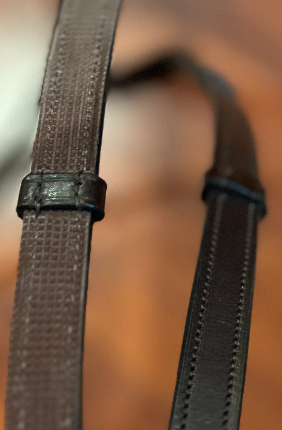 Solo Cob rolled brown rubber lined reins. New condition.