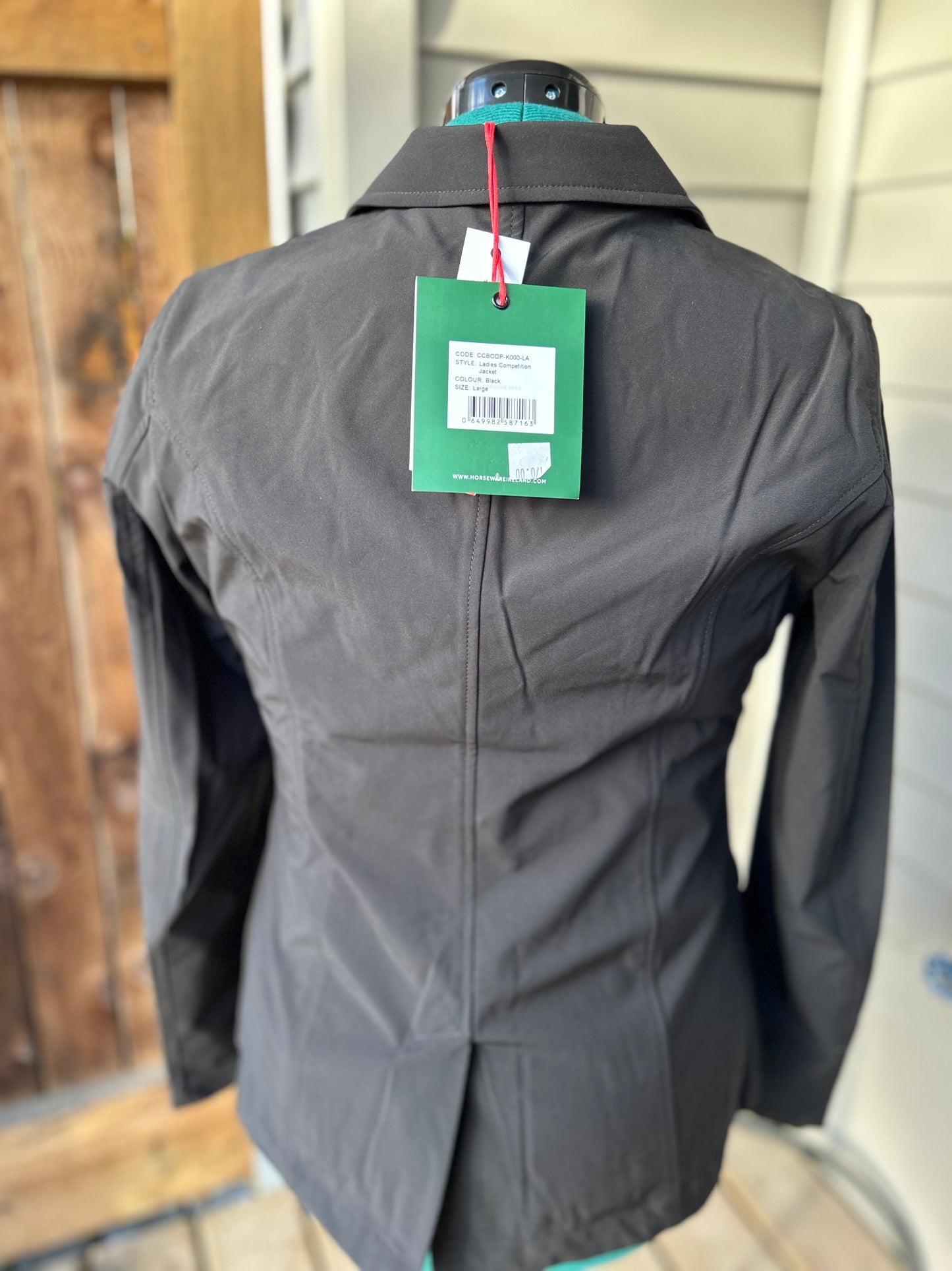 Large Horseware ladies black competition jacket.