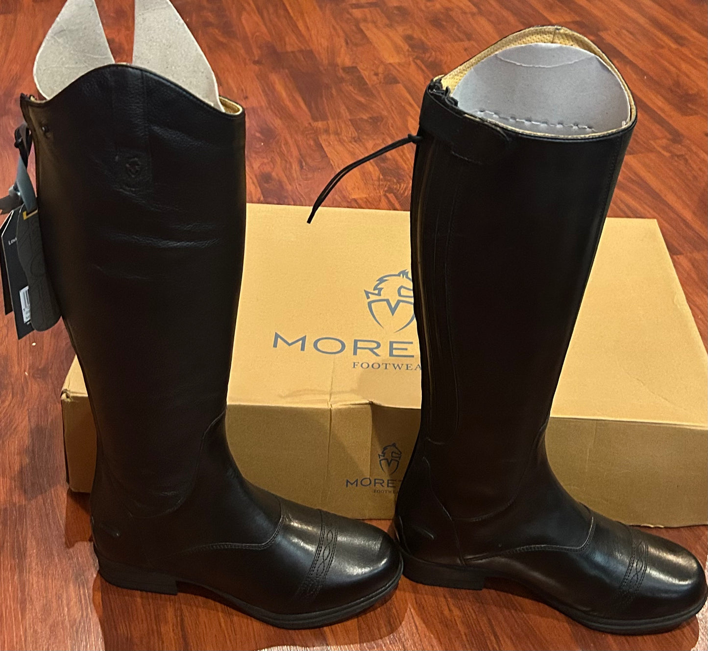 Size 9 slim calf moretta tall boots. 14” calf 18.5” tall from ground to top back. Brand new
