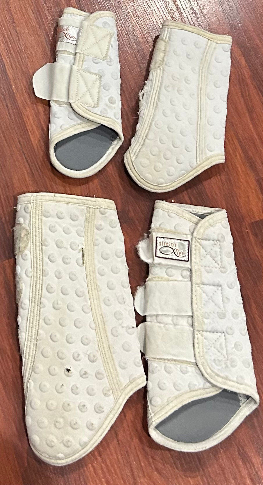 Stretch & flex white boots. Labelled size 1 and 3. Look to be S/M and Large