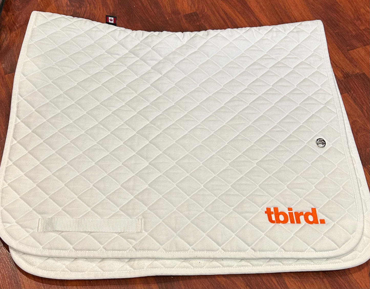 Ogilvy white pad TBIRD embroidery in orange. Brand new