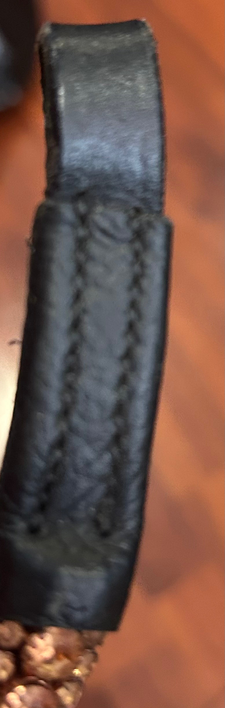16” bronze browband. Sides have been made thinner. Could be reversed to fit all bridles.