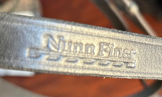 Nunn Finer leather reins with hand stops. Some wear. Buckle ends