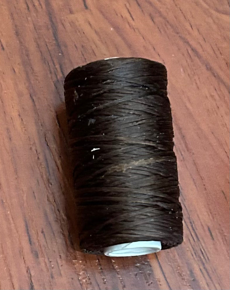 50m brown waxed thread. Brand new