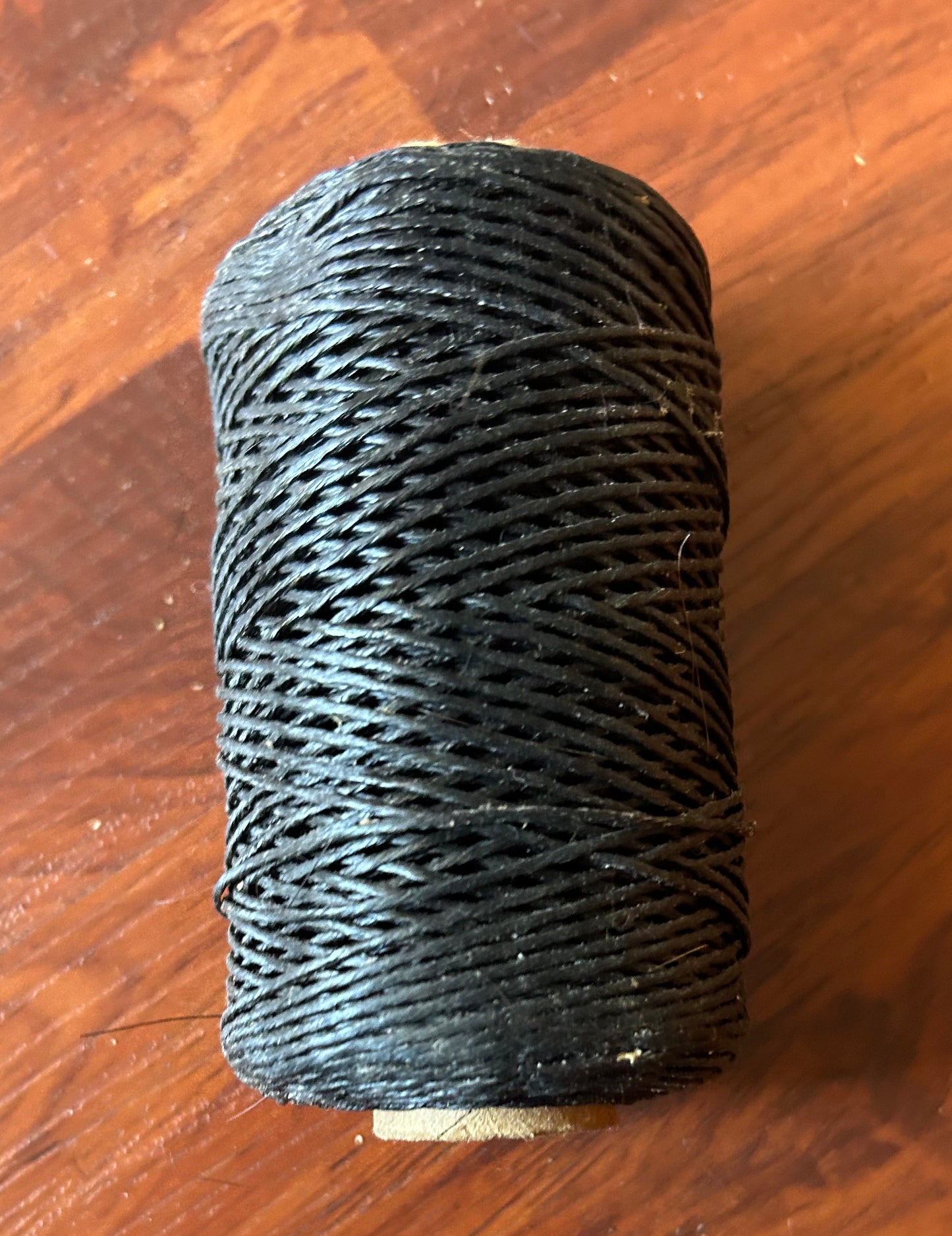Black waxed braiding thread