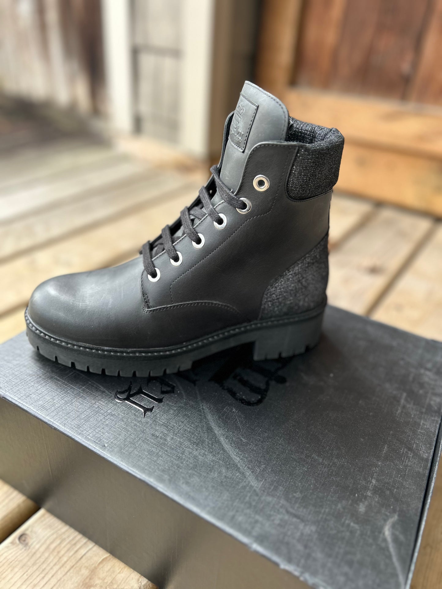 Size 40 Kingsley regina boots black. New