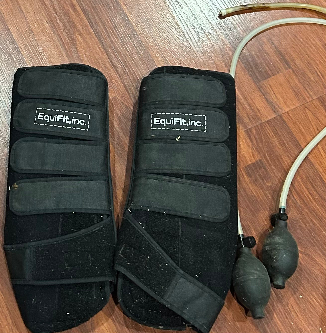 Equifit gel compression tendon boots. One boot pump attachment is broken.