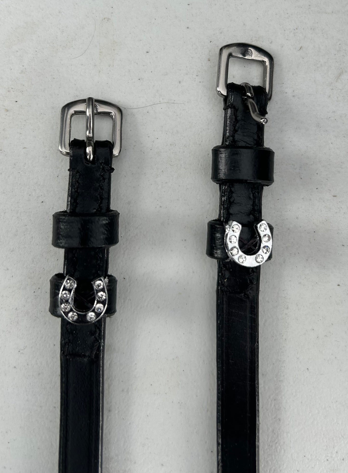 Black leather spur straps horse shoe charm