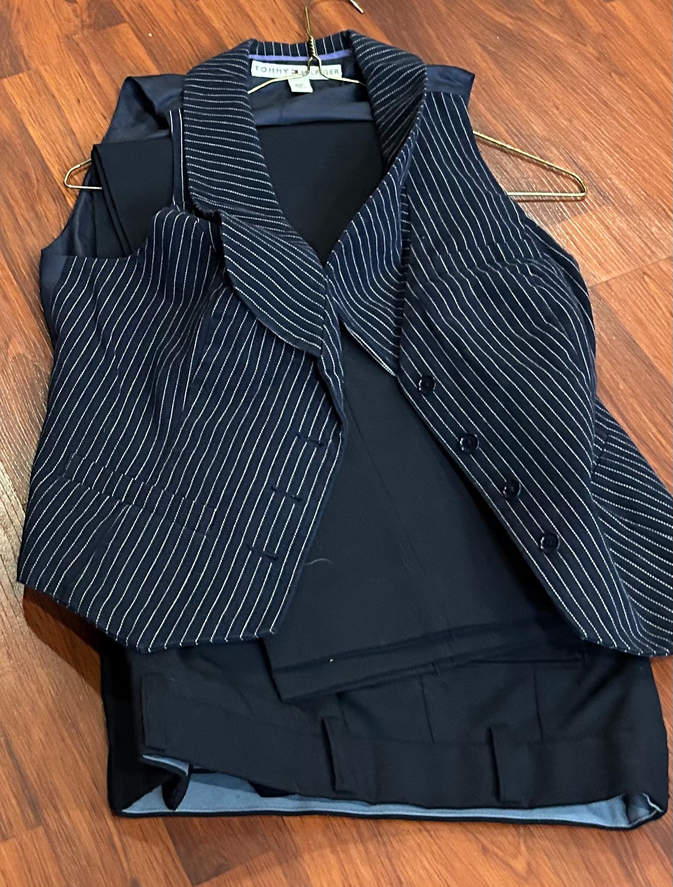 Small navy vest showmanship outfit. Pants are size 30.