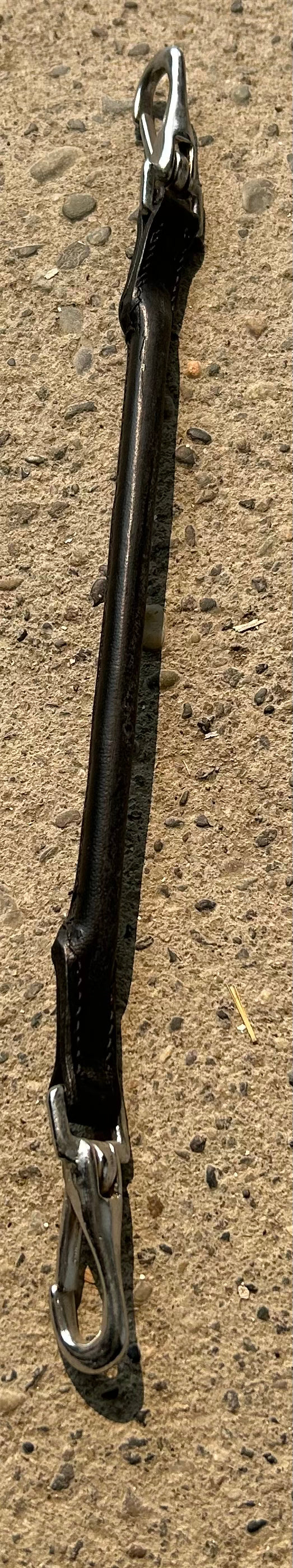 Oh sh*t strap. Black rolled with clips. New.