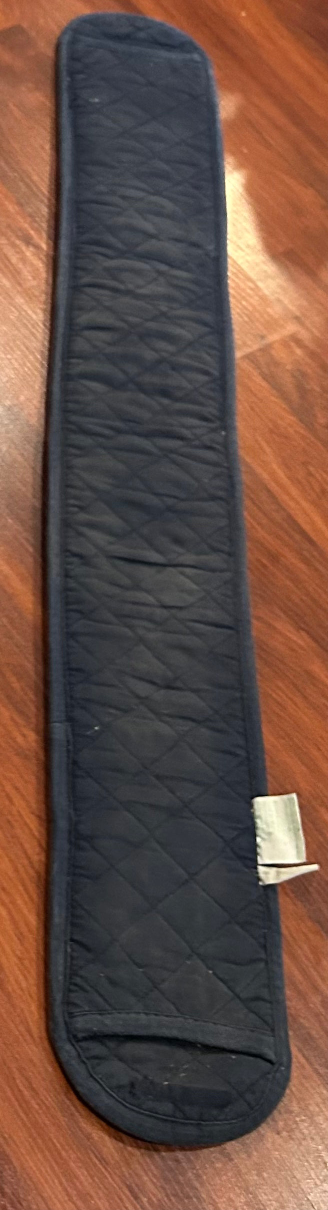 Shedrow navy quilted girth cover measures 40” end to end