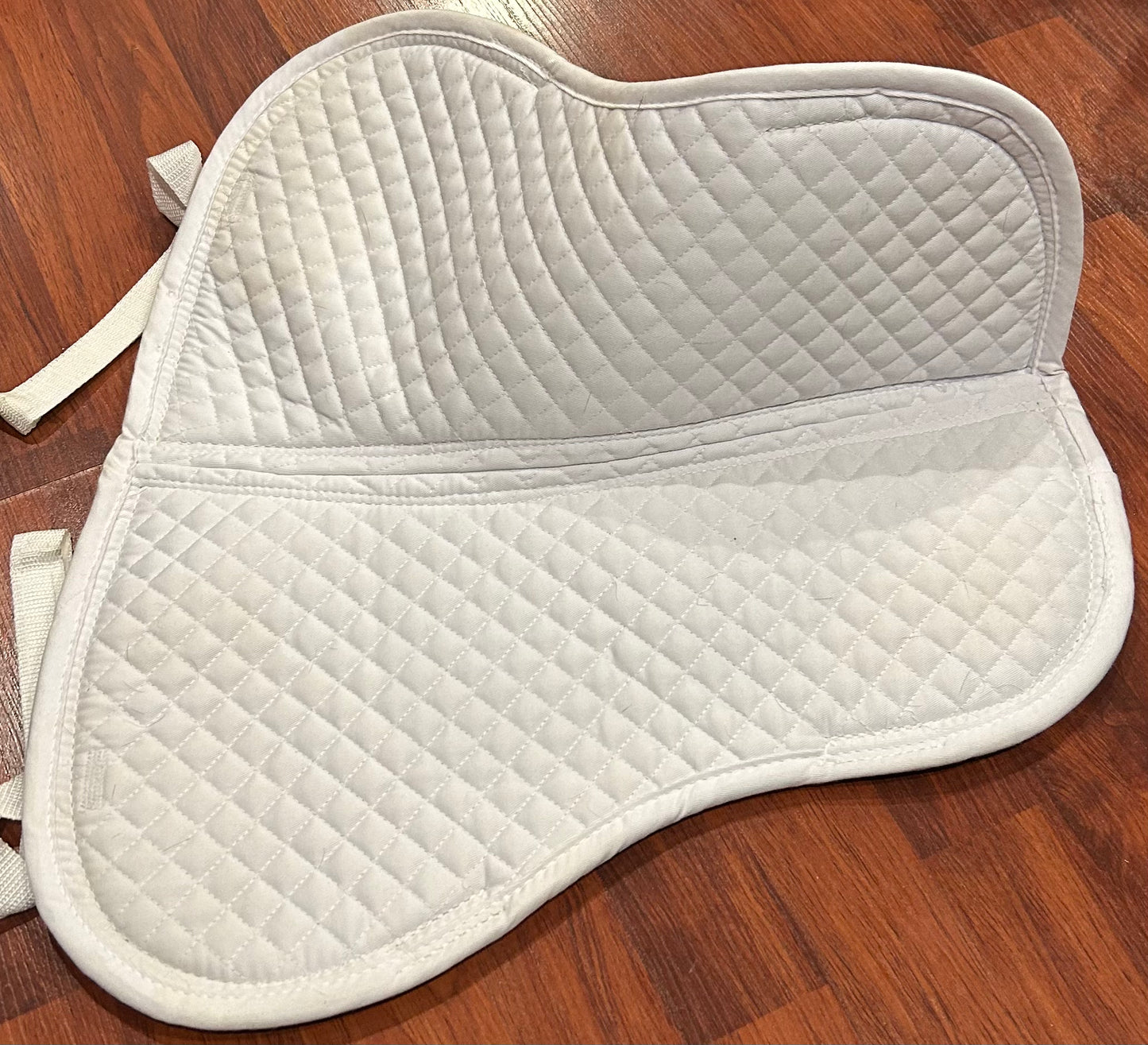 Thinline size small cotton trifecta white pad. Minor marks. Almost new.