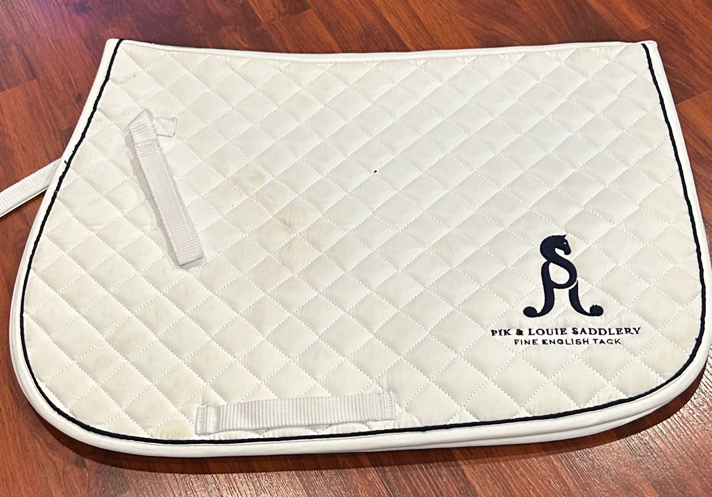 Dover white AP pad with embroidery.