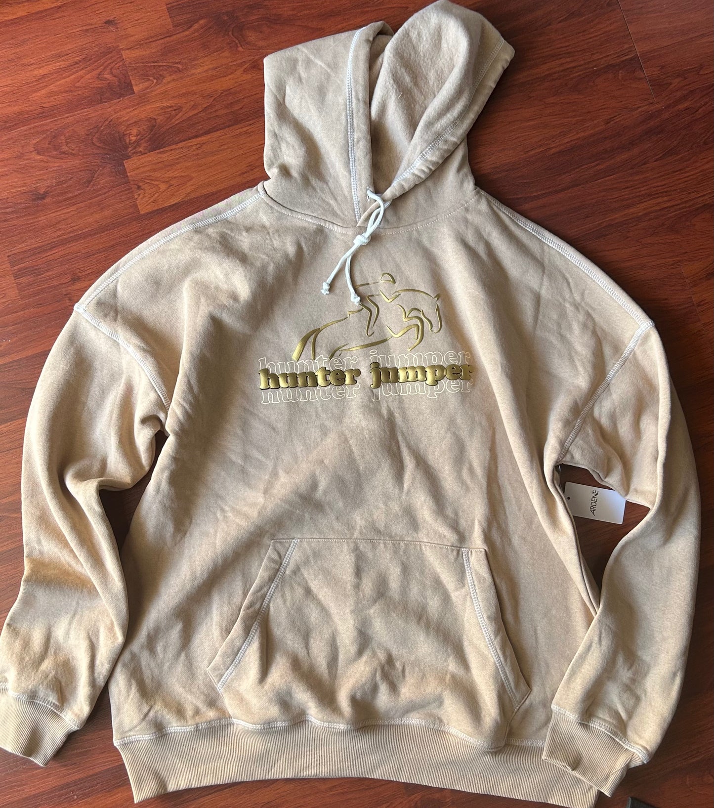 Large hunter/jumper tan hoodie. Brand new