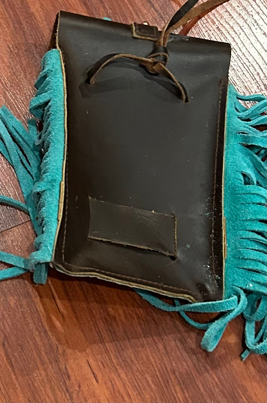 Saddle bag with teal fringe