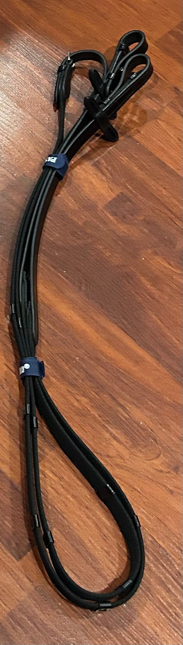 Passierblu webbed with hand stops black cob length reins. Buckle ends. Brand new.