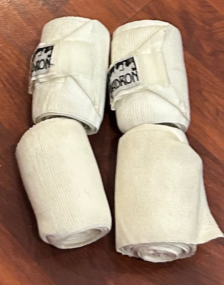 Eskadron white elastic bandages set of 4. Have been shortened. Some stains.