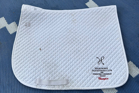 White pad with high point embroidery