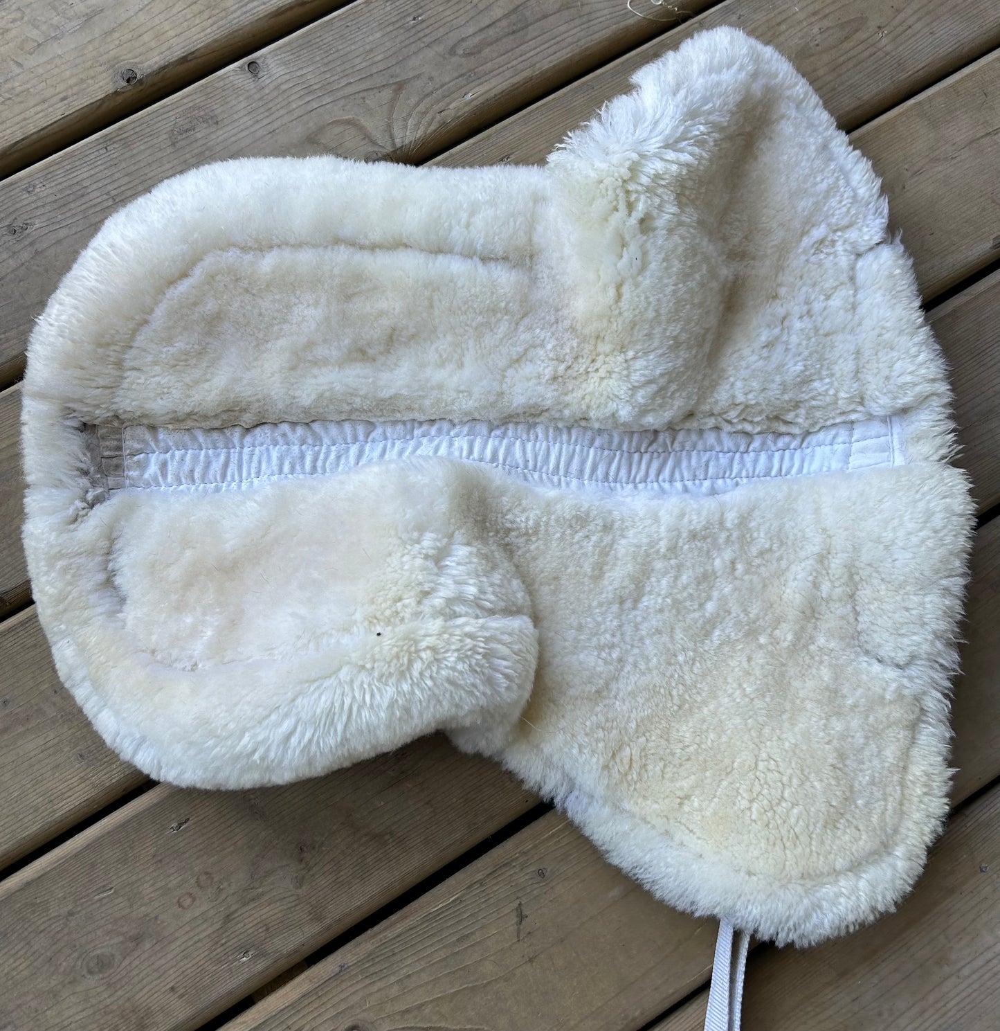 Large white sheepskin half pad. Some stains