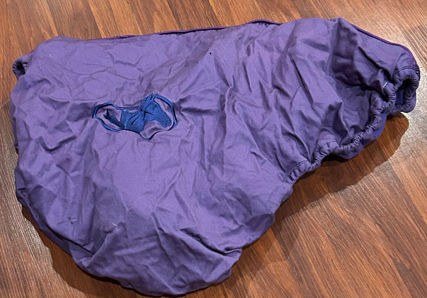 Purple fleece lined saddle cover
