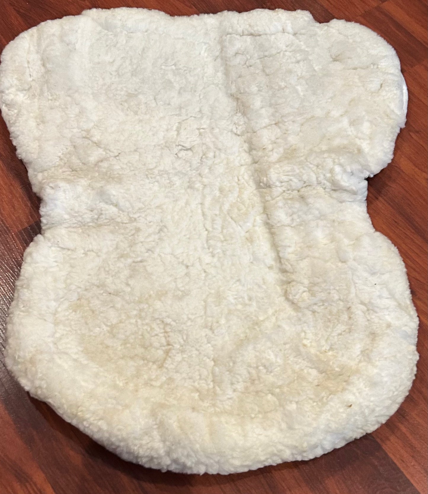 17.5” Fleeceworks sheepskin half pad. Some staining