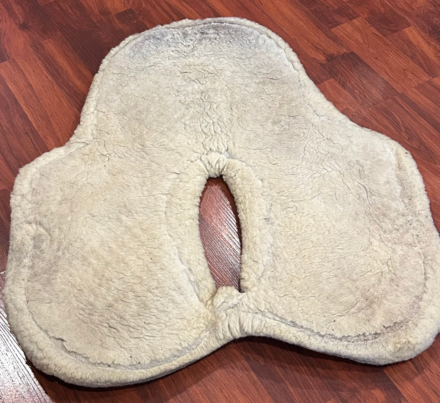 Beval therapeutic pad. Wool and felt. Measures 23” end to end