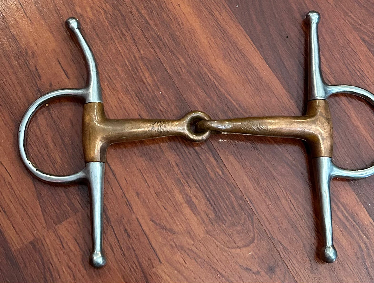 5” copper full cheek snaffle. One cheek slightly bent