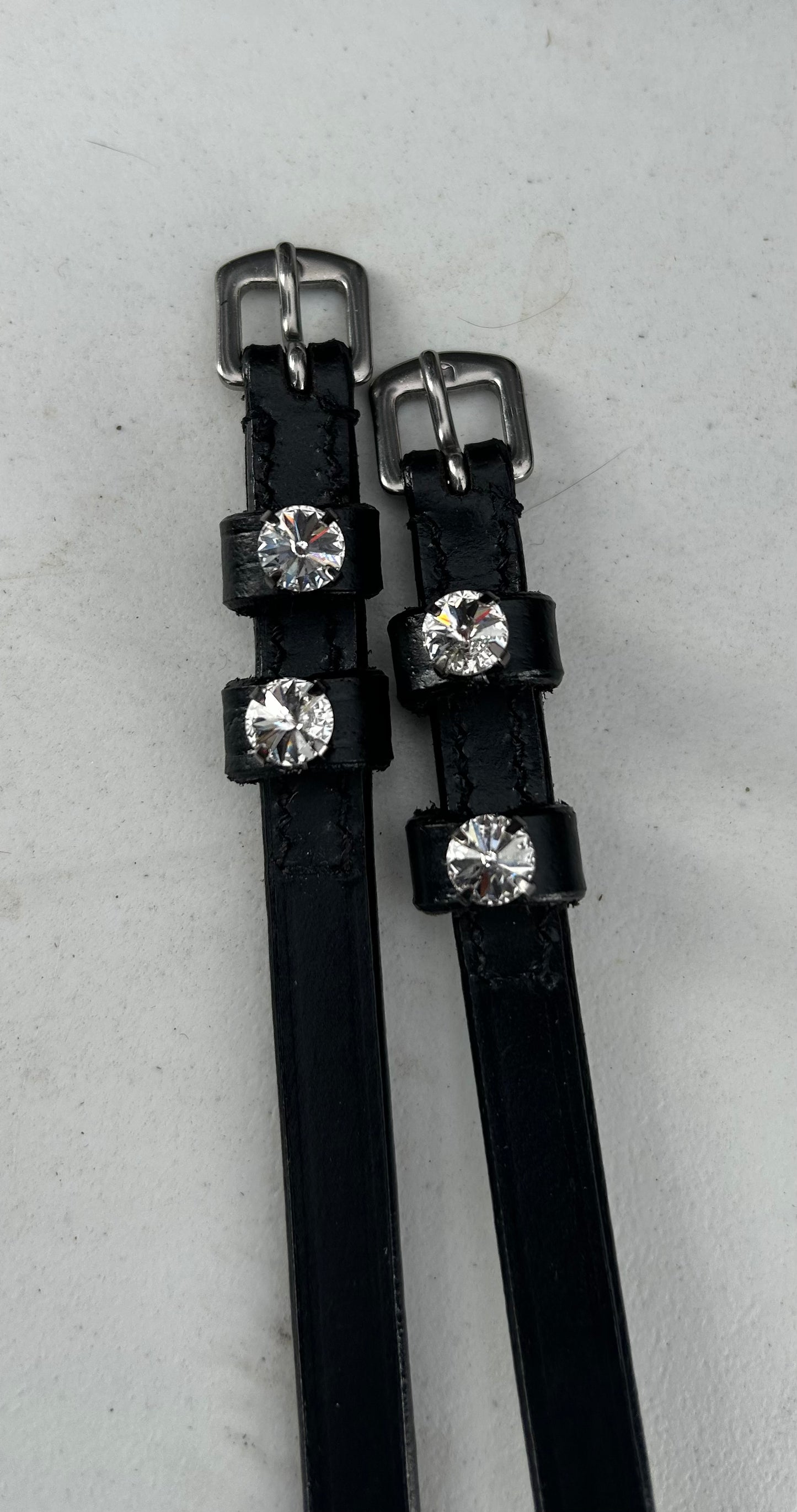 Black leather spur straps glitter stone charm