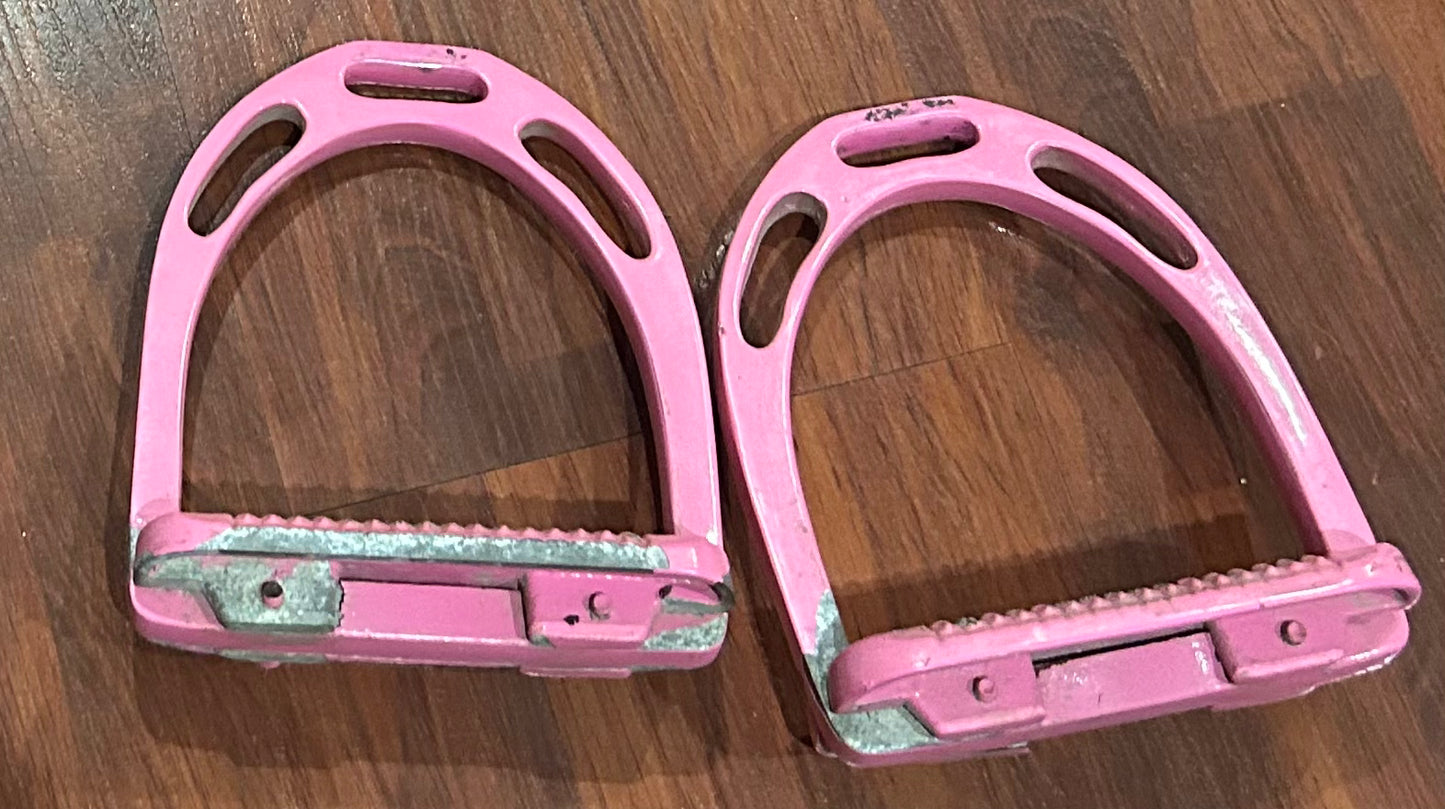 4.75” pink aluminum irons. Pink is peeling off in places. No brand mark