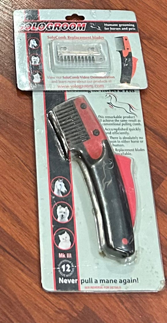 Solo comb with new extra blade. Well used but still usable.