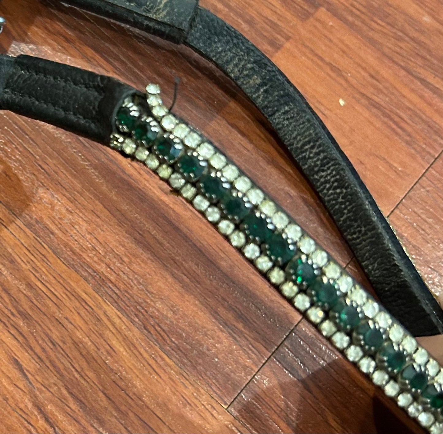 Micklem warmblood black bridle. Green crystal browband (not Micklem) stones loose ok one side