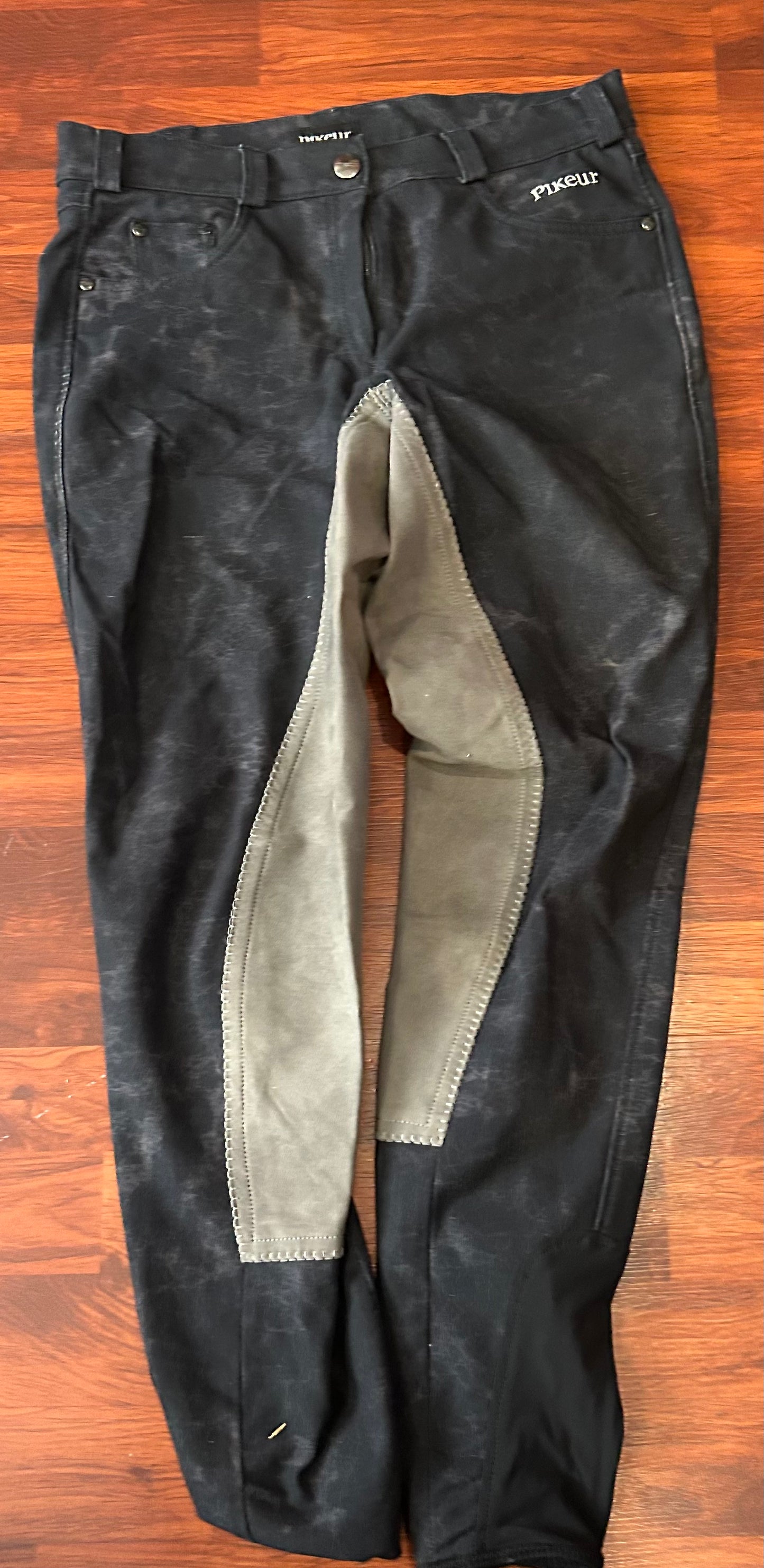 Pikeur size 28 black with pattern suede full seat breeches.