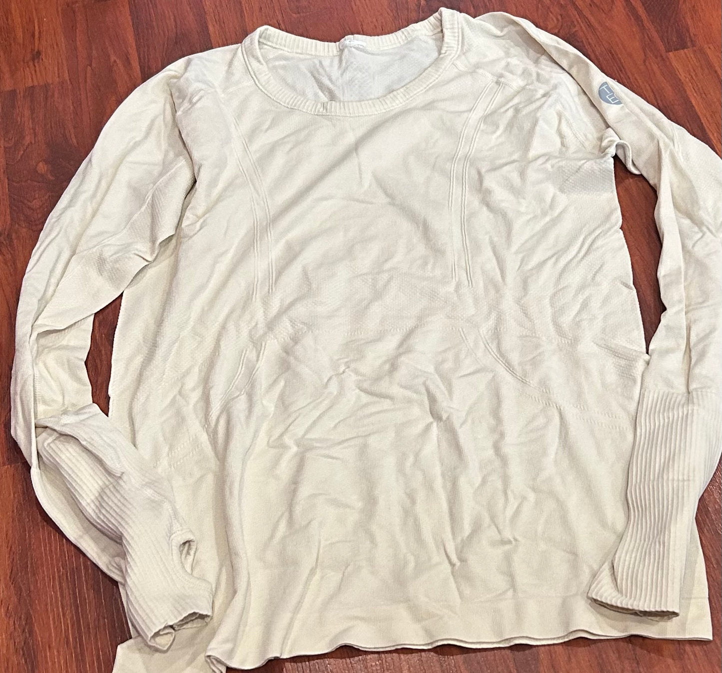 TKEQ medium beige light sweater