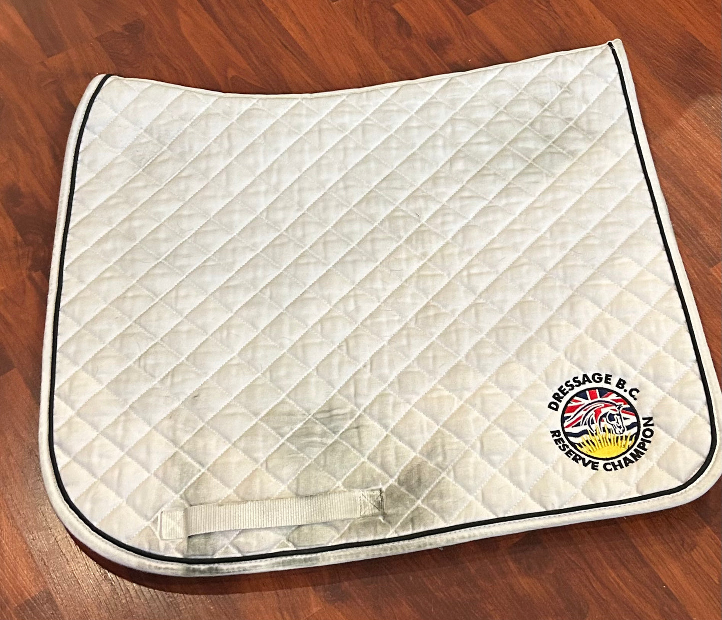 White dressage bc pad. Embroidered. Needs washed.