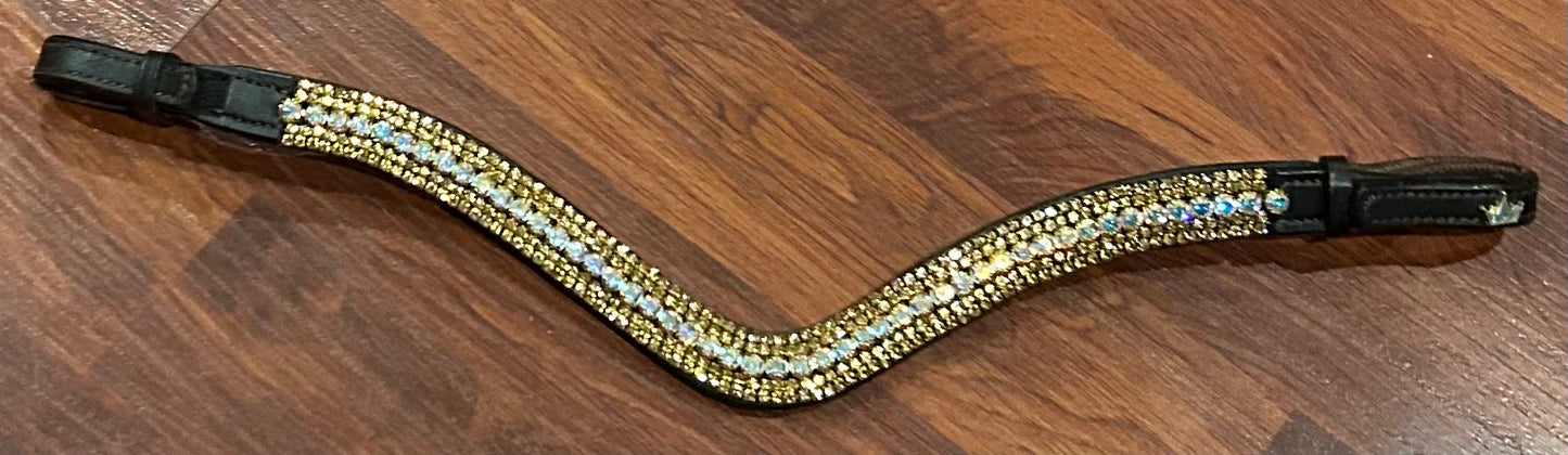 16” Schockemohle sports brown with gold stones browband. Velcros on.