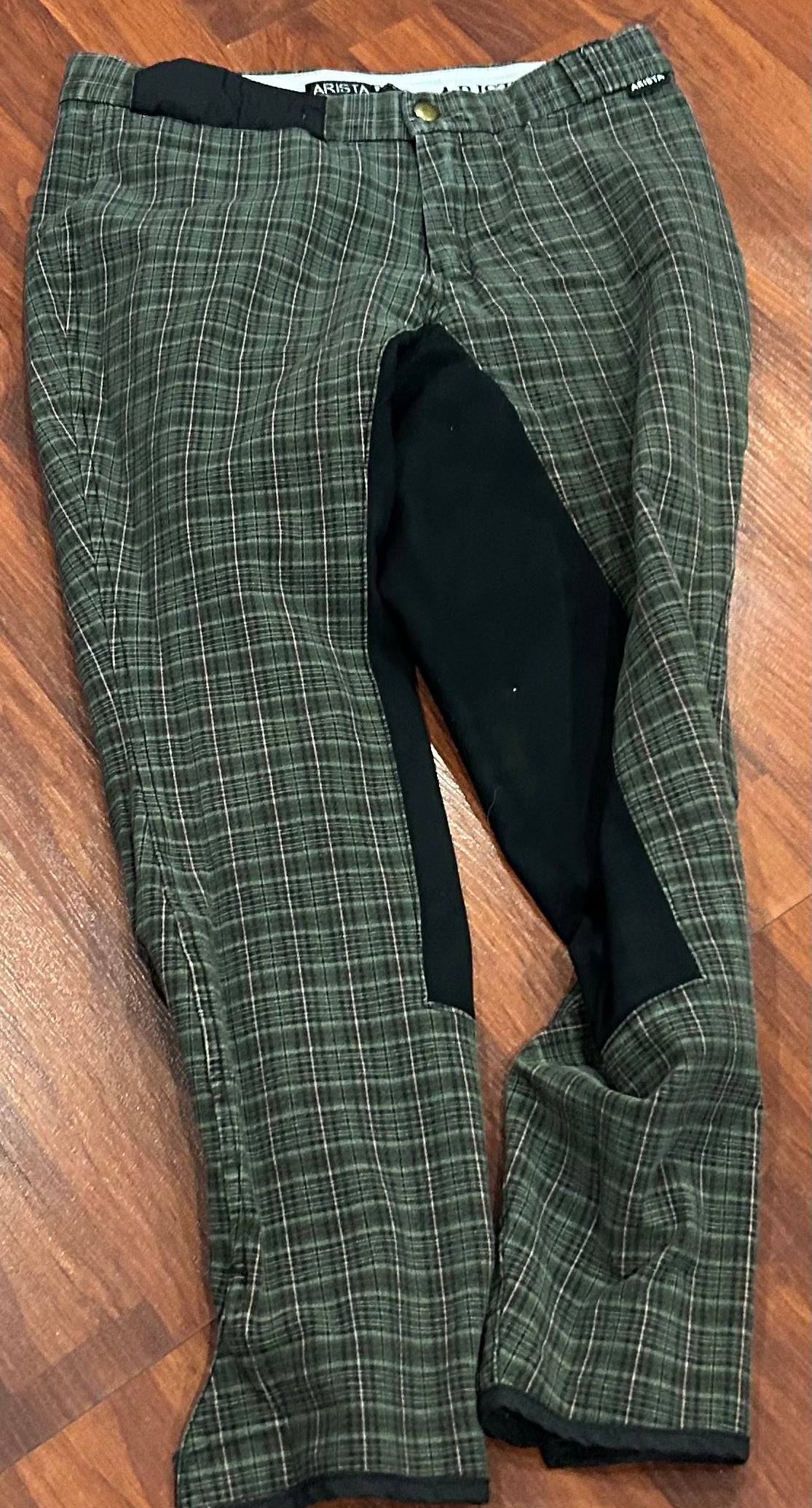 Arista size 24 green plaid full seat breeches. Velcro ankles