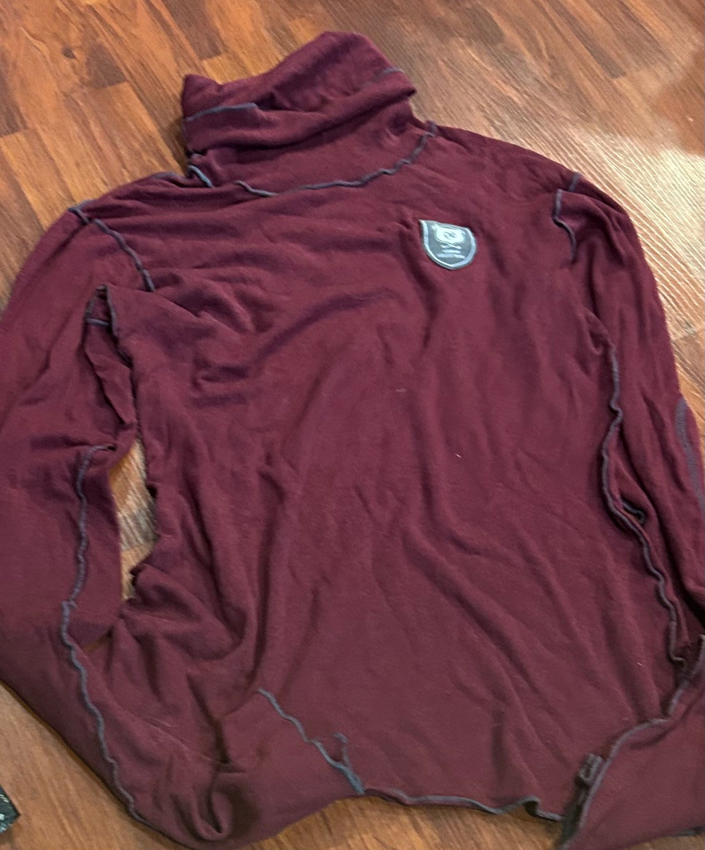 Asmar small burgundy turtle neck