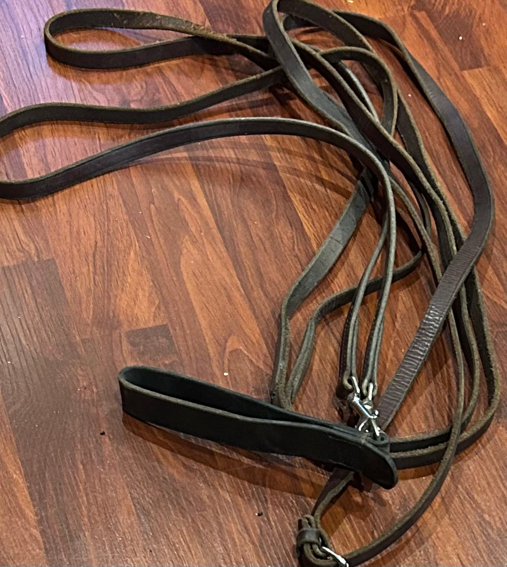 Brown leather draw reins with clips and girth attachment