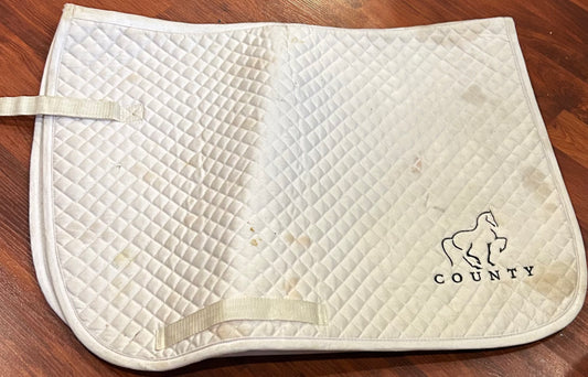 County white AP pad. Dirty