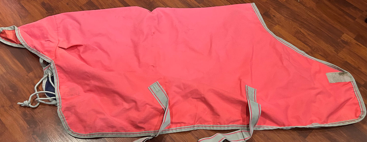 51” pink bucas rain sheet. Some snags. Likely needs waterproofing