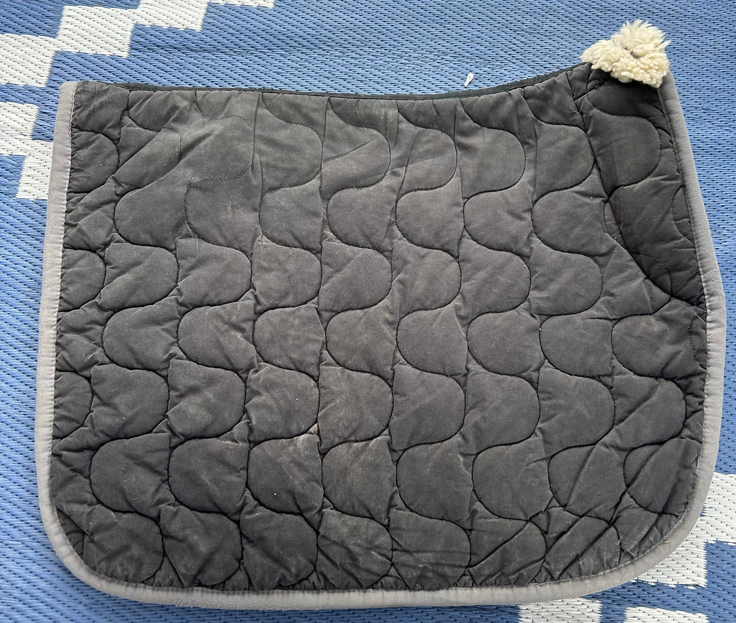 Black quilted pad