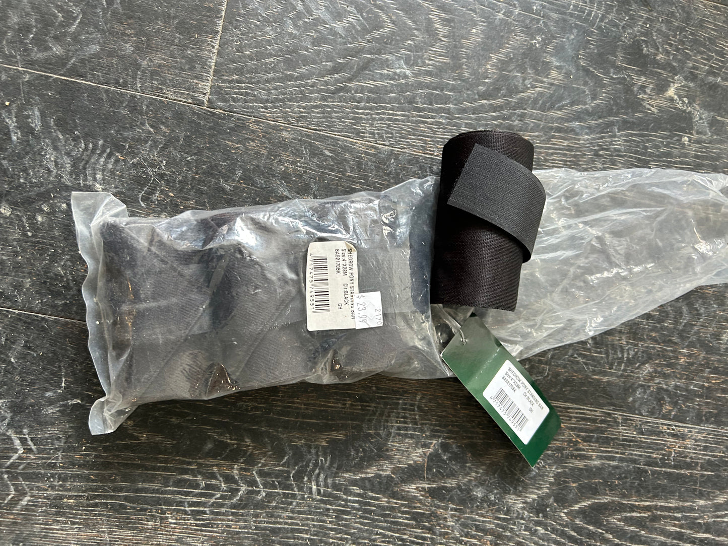 Shedrow black pony standing bandages