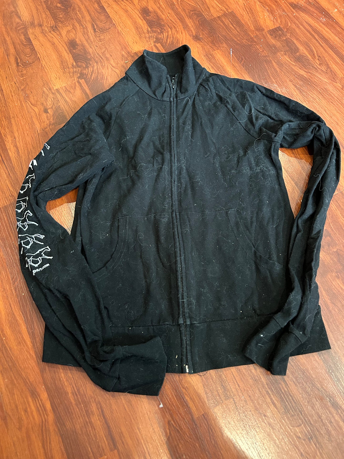 Small black zip up horsenut shirt