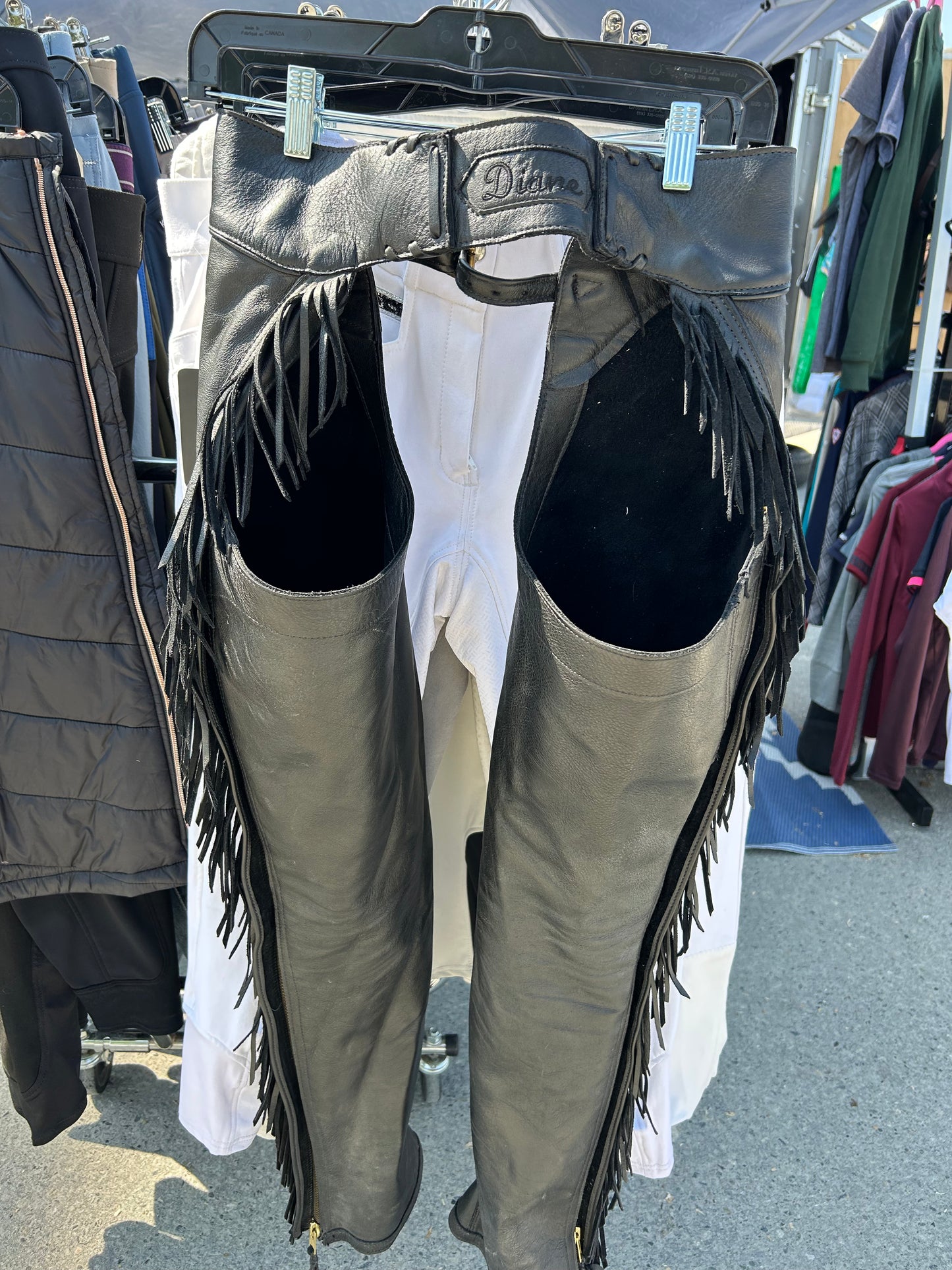 Lynn Saunders full chaps with fringe. Black. Inside leg 31”. Outside leg (waist to bottom) 40”. 13.5” calf. Waist 30”- 27” excellent condition.