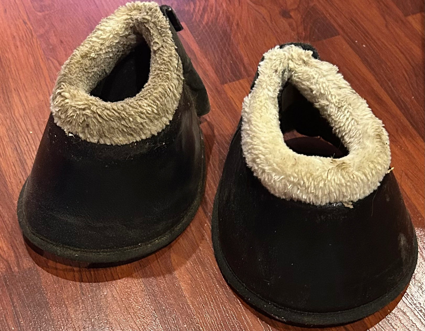 Black with white fleece large bell boots. Dirty but good shape.