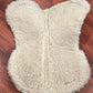White half pad rolled fleece. Older measures 17” saddle area