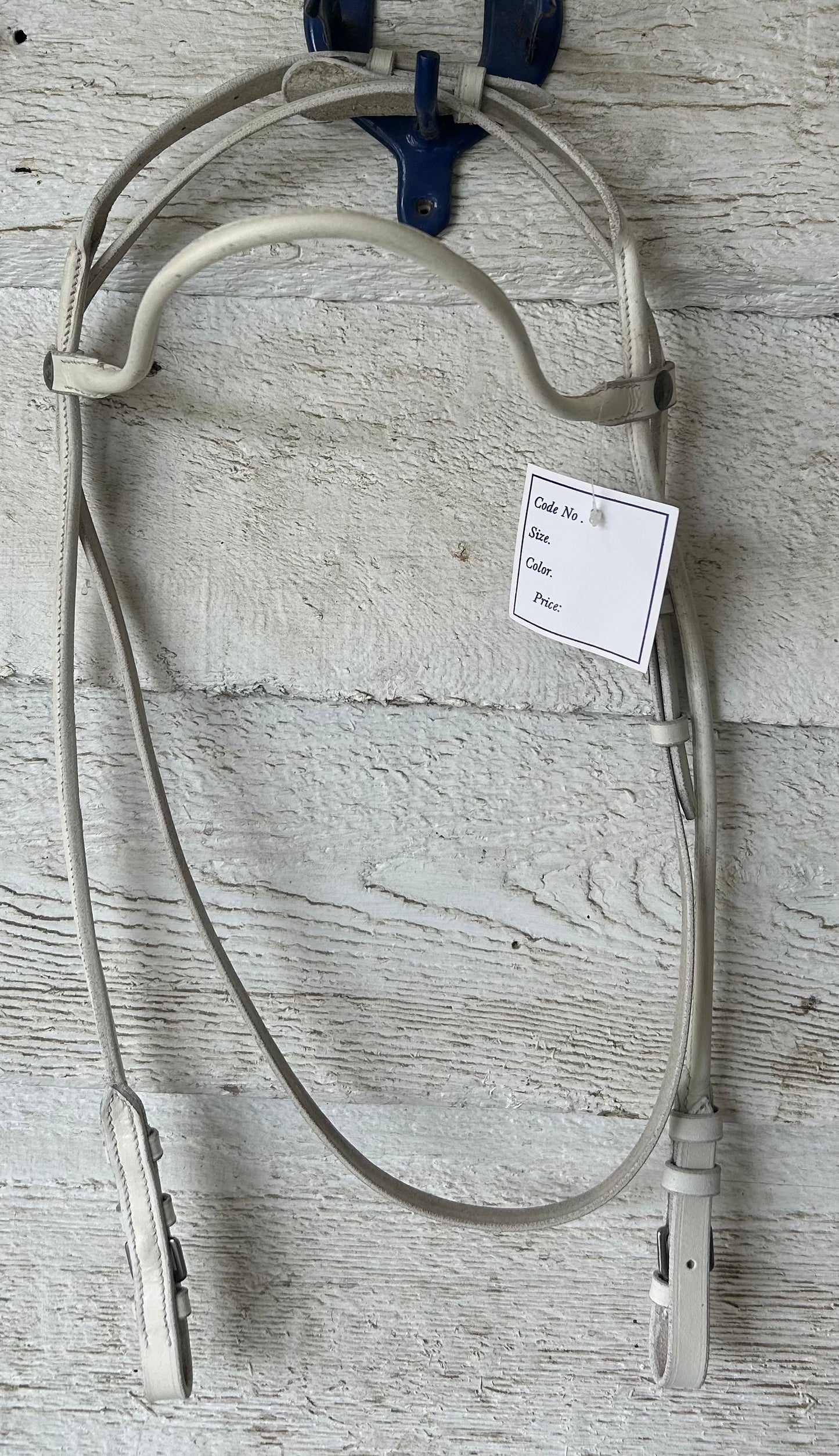 White keuring bridle rolled leather. Warmblood size